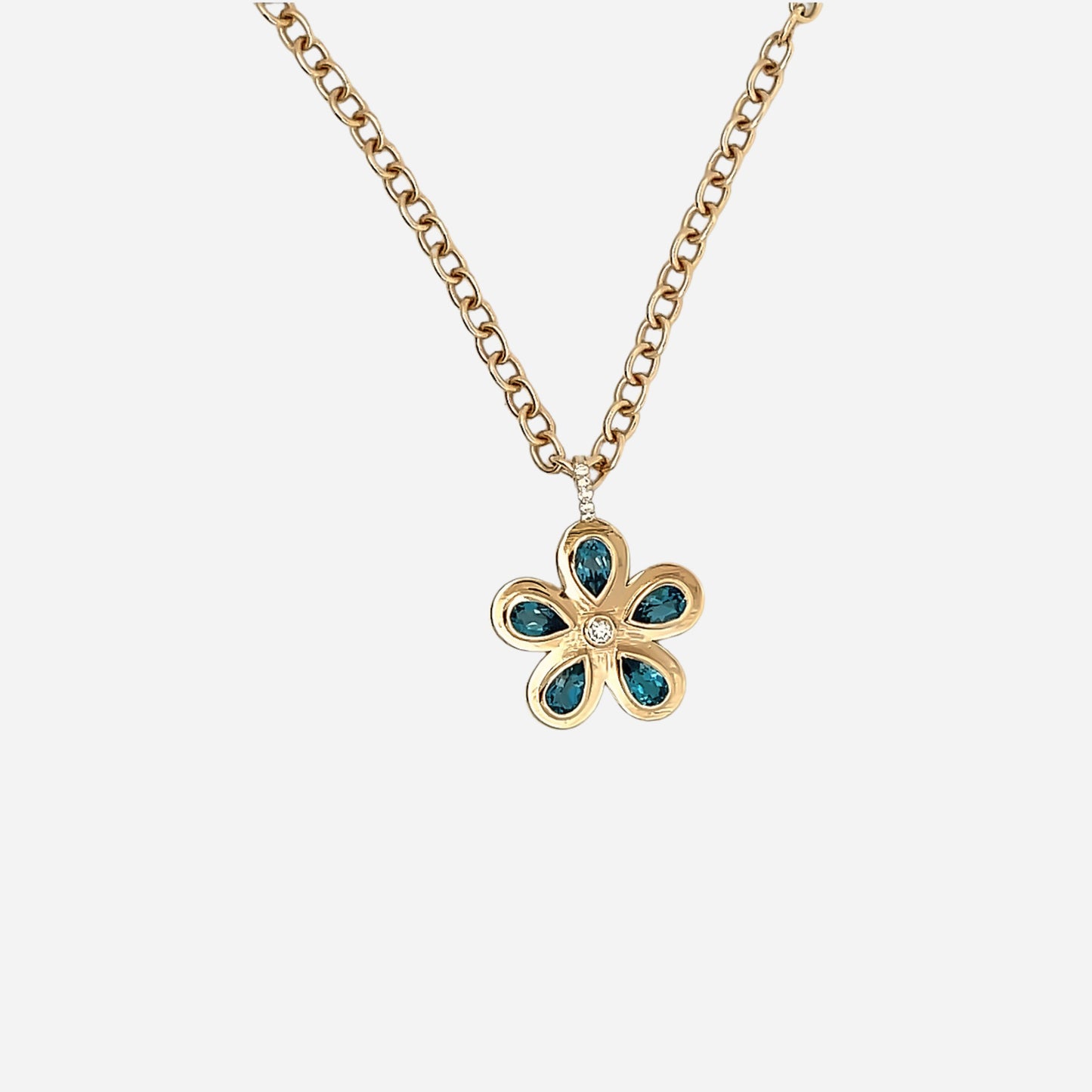 Blue Topaz and Diamond Flower Pendant